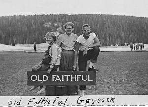 Diane, Grandma Anna, and Bobby at Old Faithful geyser sign